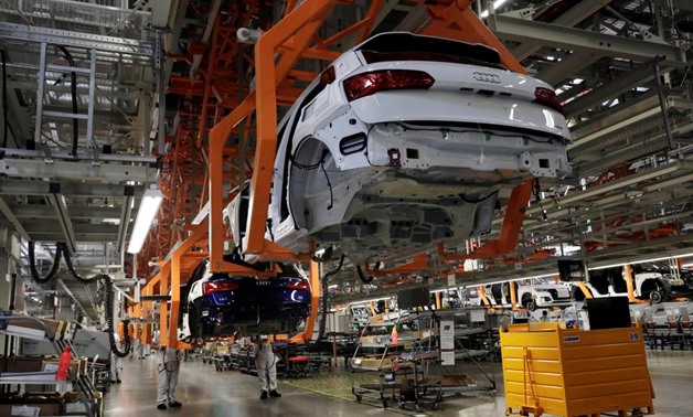 FILE PHOTO: Employees work at an Audi Q5 2.0 production line of the German car manufacturer's plant during a media tour in San Jose Chilapa, Mexico April 19, 2018. REUTERS/Henry Romero/File Photo
