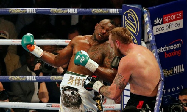 British boxer Dillian Whyte's troubled journey to becoming a world title contender took a step in the right direction with a unanimous points decision over former world heavyweight champion Joseph Parker
AFP / ADRIAN DENNIS
