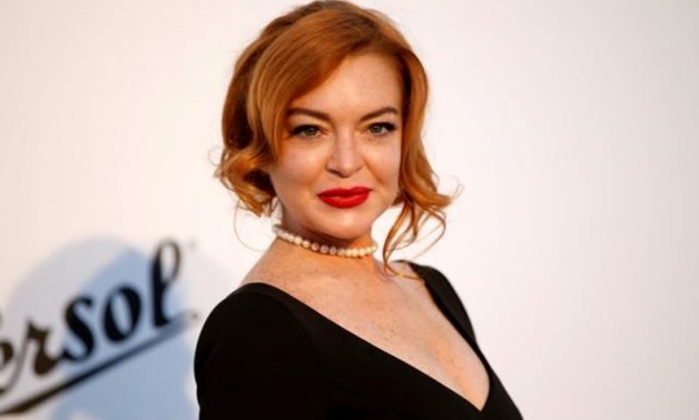 FILE PHOTO: Lindsay Lohan poses upon arrival at the 70th Cannes Film Festival The amfAR's Cinema Against AIDS 2017 event in Antibes, France on May 25, 2017. . REUTERS/Stephane Mahe/File Photo.