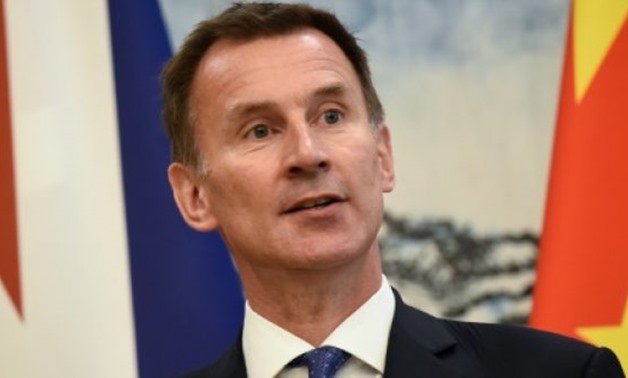 © AFP | Hunt began his international tour with a visit to China
