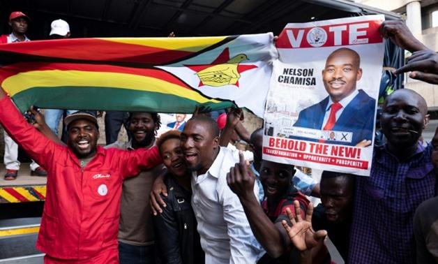 Supporters of opposition presidential candidate Nelson Chamisa were buoyant Tuesday but authorities warned vote counting would likely take several more days to complete
