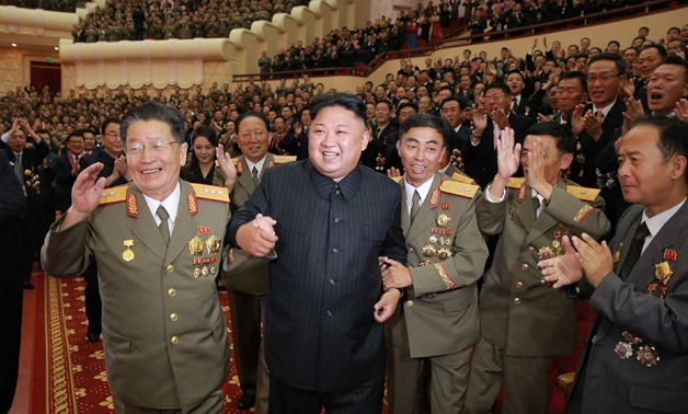 North Korean leader Kim Jong Un (center) at an art performance dedicated to nuclear scientists and technicians. AFP