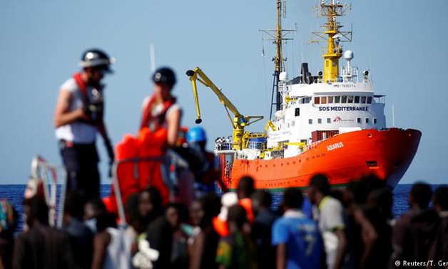 Tunisia allows boat with migrants to dock after leaving it stranded for two weeks