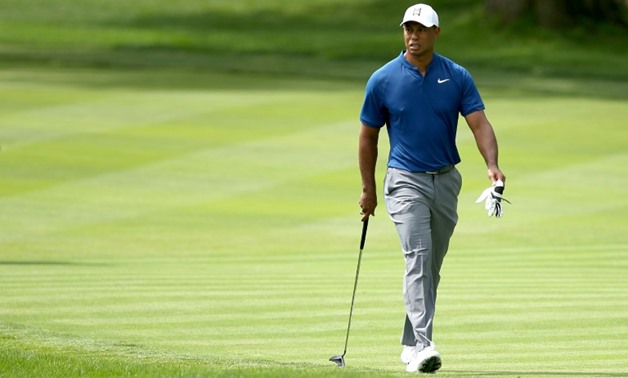 Tiger Woods of the US walks across the 16th hole during World Golf Championships-Bridgestone Invitational - Round One, at Firestone Country Club South Course in Akron, Ohio, on August 2, 2018
GETTY/AFP / Dylan Buell
