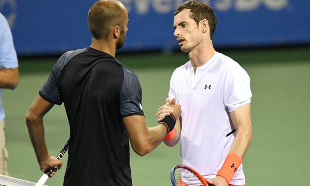 Three-time Grand Slam champion Andy Murray (R) outlasted Romania's Marius Copil in a marathon three-hour match -- Murray's first hardcourt event after an 11-month layoff for a right hip injury
GETTY IMAGES NORTH AMERICA/AFP / Mitchell Layton
