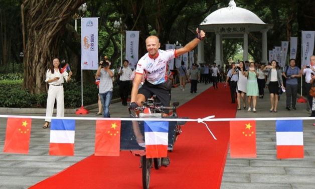 Raf van Hulle took just 49 days to complete the 12,000 kilometre journey from the French city of Lyon to Guangzhou in southern China
AFP / -
