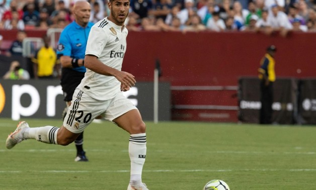 Marco Asensio entered the game at the start of the second half and scored less than two minutes in before adding another in the 56th minute as Real Madrid rallied to beat Juventus 3-1 in a pre-season exhibition contest
AFP / NICHOLAS KAMM
