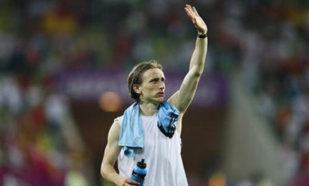 Croatia's Luka Modric waves at the end of their Group C Euro 2012 soccer match against Spain at the PGE Arena in Gdansk June 18, 2012. REUTERS/Kai Pfaffenbach
