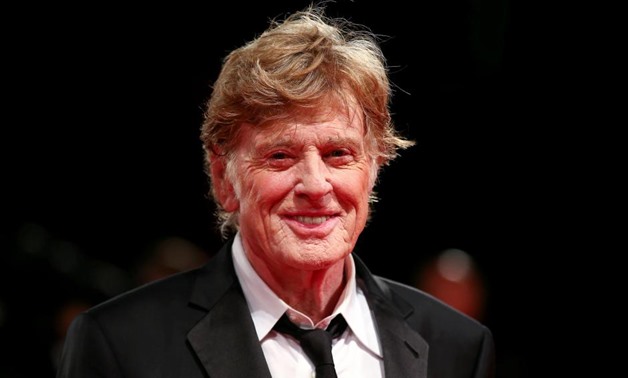 FILE PHOTO: Actor Robert Redford poses during a red carpet to receive a Golden Lion award for lifetime achievement at the 74th Venice Film Festival in Venice, Italy, September 1, 2017. REUTERS/Alessandro Bianchi/File Photo
