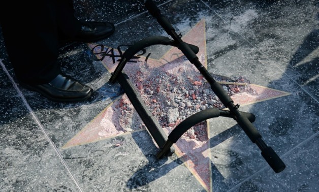 The remains on Donald Trump's star on the Hollywood Walk of Fame after it was vandalized in July-GETTY IMAGES/AFP / Katharine Lotze

