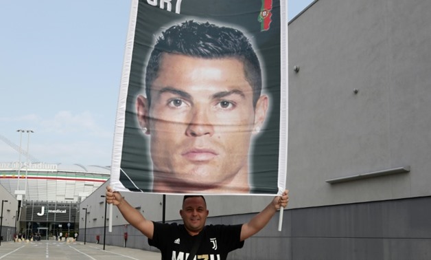 Cristiano Ronaldo, who has left Real Madrid for Juventus, will pay the Spanish authorities a reduced sum for dodging taxes on image rights.
AFP/File / Isabella Bonotto
