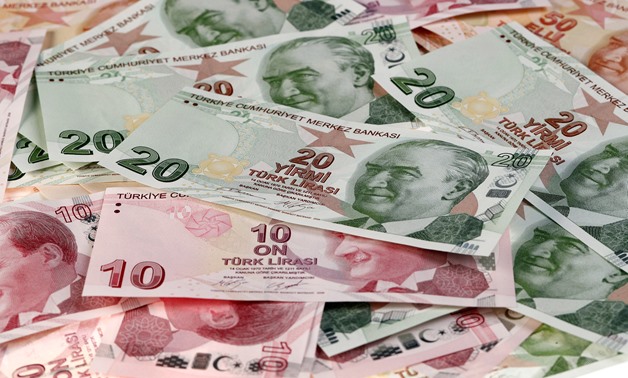 FILE PHOTO: Turkish Lira banknotes are seen in this October 10, 2017 picture illustration. REUTERS/Murad Sezer/Illustration/File Photo
