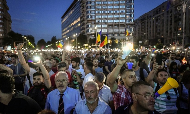 Massive crowds gathered in downtown Bucharest for a second straight night to protest corruption
