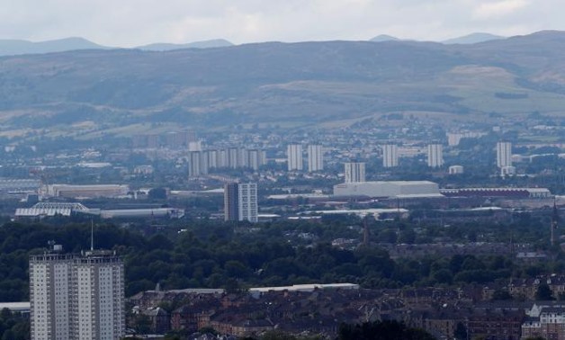 Blocks of flats in the city of Glasgow are seen from Cathkin Braes, Scotland, Britain August 7, 2018. REUTERS/Russell Cheyne