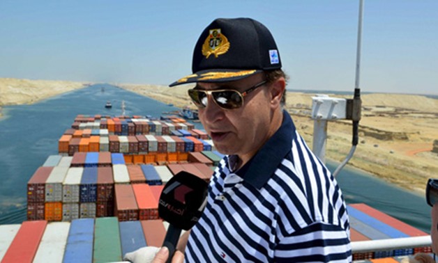 File photo: Mohab Mameesh, chairman of the Suez Canal Authority ,talks to state TV as he checks work at the New Suez Canal, Ismailia, Egypt, July 25, 2015 (Reuters)