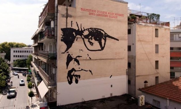 A giant mural depicts Italian composer Ennio Morricone created by Asterios Laskaris, Christos Laskaris and Dimitra Kalogirou under the auspices of the Greek Cultural Association Friends of Ennio Morricone's Music, in Larissa, Greece, July 24, 2018. REUTER