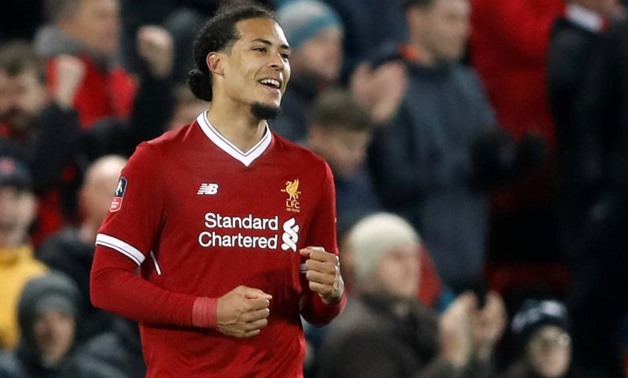 Soccer Football - FA Cup Third Round - Liverpool vs Everton - Anfield, Liverpool, Britain - January 5, 2018 Liverpool’s Virgil van Dijk celebrates with Joel Matip at the end of the match Action Images via Reuters/Carl Recine
