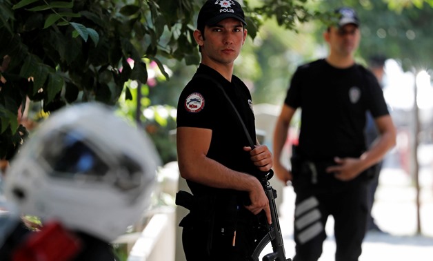 Police officers patrol outside the home of U.S. pastor Andrew Brunson in Izmir, Turkey August 17, 2018. REUTERS/Osman Orsal