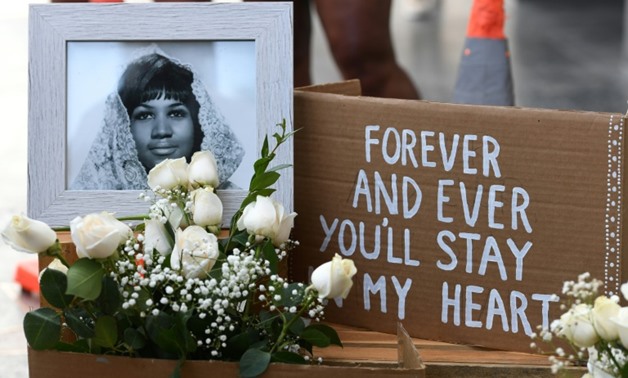 Flowers and tributes are placed on the star for Aretha Franklin on the Hollywood Walk of Fame in California
