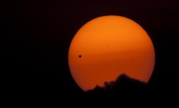 The planet Venus makes its transit across the Sun as seen from Kathmandu June 6, 2012. Venus made a slow transit across the face of the sun on Tuesday - Reuters