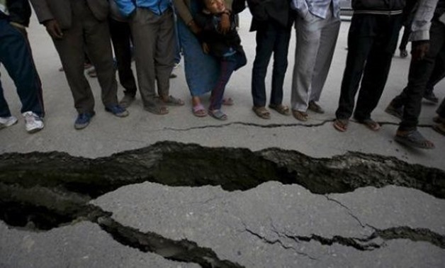 A file photo of cracks visible on a road after an earthquake. | Photo: Reuters
