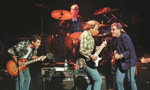 FILE PHOTO: American rock group The Eagles, shown performing in 1998 in London, Britain. REUTERS/David McNew/File Photo.