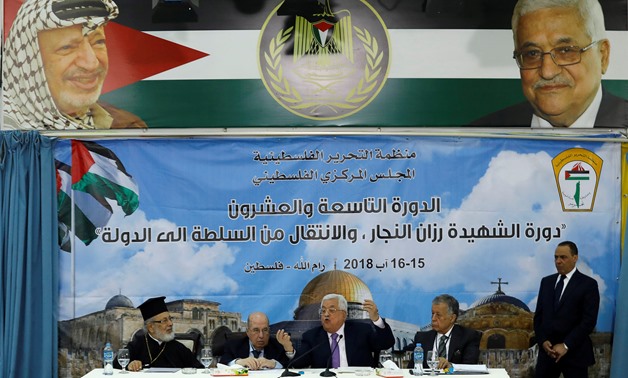 Palestinian President Mahmoud Abbas gestures as he speaks during the meeting of the Palestinian Central Council, in Ramallah, in the occupied West Bank August 15, 2018. REUTERS/Mohamad Torokman
