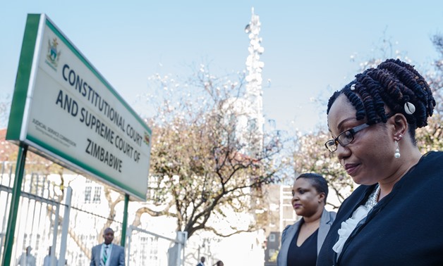 Zimbabwe Electoral Commission (ZEC) chairperson Priscilla Chigumba arrives at Harare courthouse, on August 22, 2018, ahead of the sitting of the Zimbabwe Constitutional Court to hear a petition by the main opposition seeking to overturn the results of the