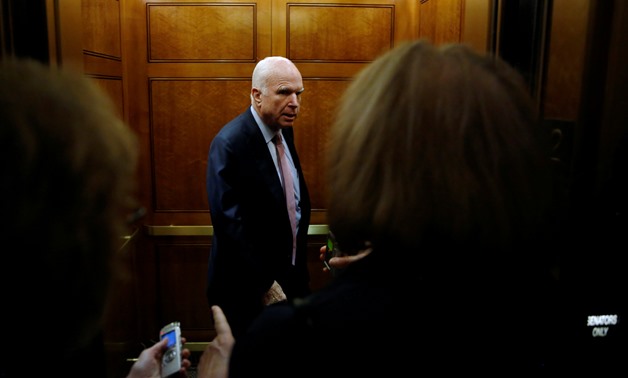 FILE PHOTO: U.S. Senator John McCain (R-AZ) departs the Senate floor after the body's first vote upon returning from their August recess at the U.S. Capitol in Washington, U.S. September 5, 2017. REUTERS/Jonathan Ernst/Files

