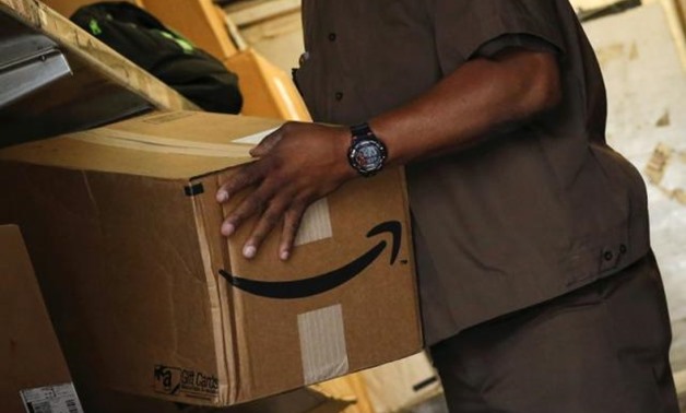 U.S. calls foreign mail system unfair in surprise win for Amazon | Reuters
