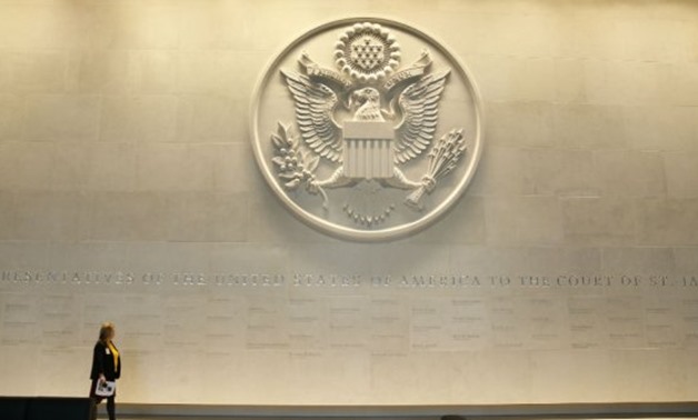 © Alastair Grant / POOL / AFP | A large Department of State embossed seal.
