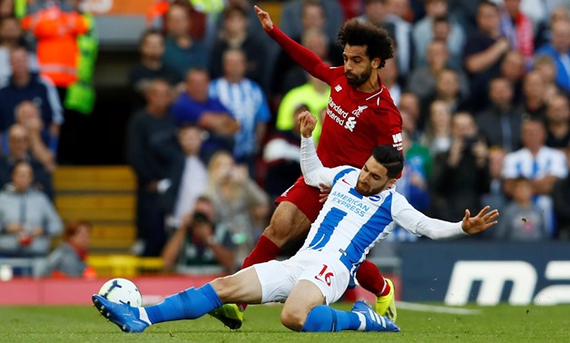 Brighton's Alireza Jahanbakhsh in action with Liverpool's Mohamed Salah on August 25, 2018 via Reuters/Jason Cairnduff