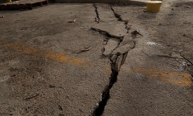 File: A crack is seen on the ground after an earthquake - Reuters
