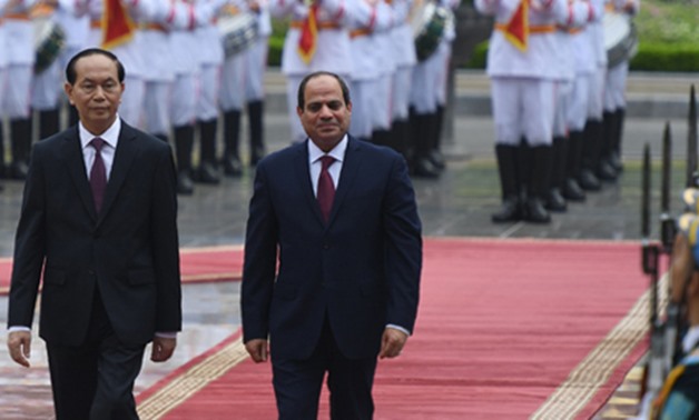 File Photo: Egypt's President Abdel-Fattah El-Sisi (R) and Vietnamese counterpart Tran Dai Quang (L) during a welcoming ceremony at the presidential palace in Hanoi in September 2017 (Photo: AFP)
