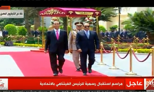 Egypt's President Abdel-Fatah al-Sisi (R) and Vietnamese counterpart Trần Đại Quang at Ittihadiya Palace - Screen shot from CBC channel 
