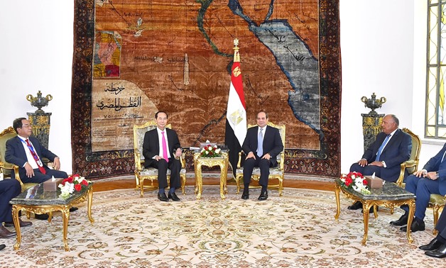 President Abdel Fatah al-Sisi (R) and Tran Dai Quang (L) - Press Photo