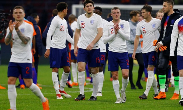 ... vs England - Johan Cruijff Arena, Amsterdam, Netherlands - March 23, 2018 England's Harry Maguire and Jamie Vardy after the match REUTERS/Michael Kooren
