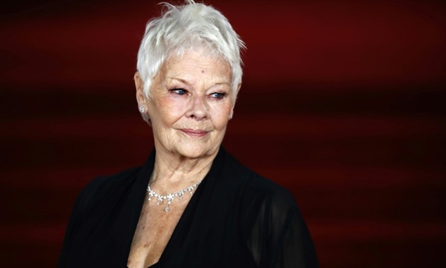 British actress Judi Dench made her screen debut in 1964 and has worked with many star directors including Clint Eastwood and Sam Mendes-POOL/AFP/File / Tolga AKMEN

