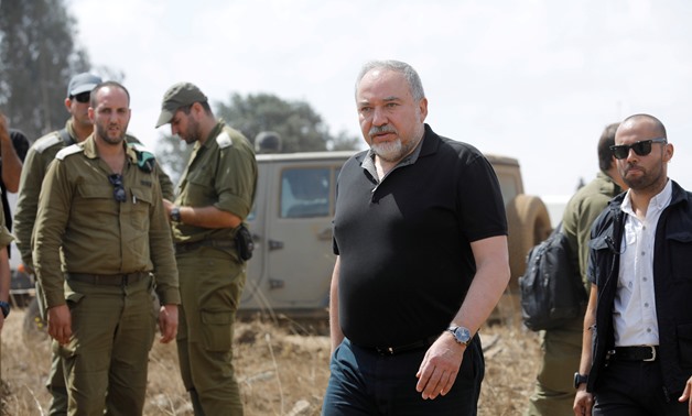 FILE PHOTO: Israeli Defence Minister Avigdor Lieberman visits an army drill in the Israeli-occupied Golan Heights near the border with Syria, Aug. 7, 2018. REUTERS/Amir Cohen