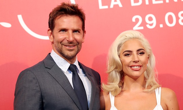 The 75th Venice International Film Festival - Photocall for the film "A Star is Born" out of competition - Venice, Italy, August 31, 2018 - Director and actor Bradley Cooper with actor Lady Gaga. REUTERS/Tony Gentile