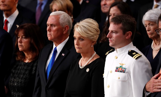 Cindy McCain, wife of late U.S. Senator John McCain stands with her son John (R) and Vice President Mike Pence and his wife Karen Pence (L) during ceremonies honoring Senator McCain inside the U.S. Capitol Rotunda in Washington, U.S., August 31, 2018. REU