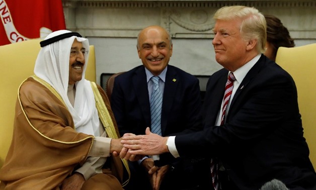 FILE PHOTO: U.S. President Donald Trump (R) welcomes Emir of Kuwait Sabah Al-Ahmad Al-Jaber Al-Sabah (L) in the Oval Office at the White House in Washington, U.S., September 7, 2017./File Photo
