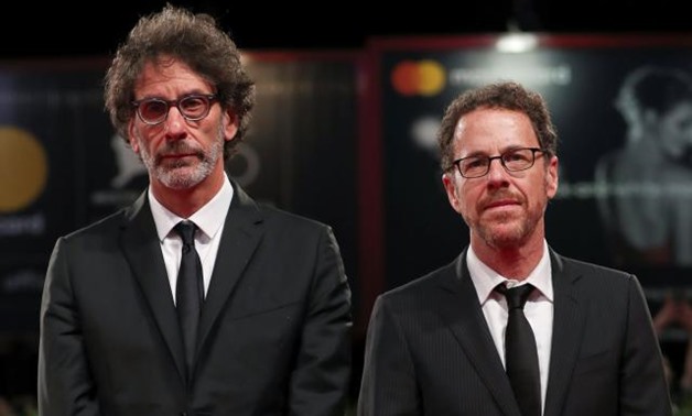 The 75th Venice International Film Festival - ?Screening of the film "The Ballad of Buster Scruggs" competing in the Venezia 75 section - Red Carpet Arrivals - Venice, Italy, August 31, 2018 - Directors Ethan Coen and Joel Coen pose. REUTERS/Tony Gentile.