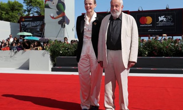 The 75th Venice International Film Festival - Screening of the film "Peterloo" competing in the Venezia 75 section - Red Carpet Arrivals - Venice, Italy, September 1, 2018 - Director Mike Leigh and cast member Maxine Peake pose. REUTERS/Tony Gentile.