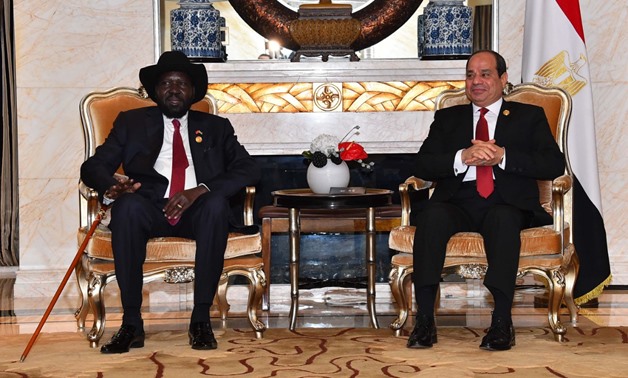 FILE- Sisi and Kiir during their meeting in Beijing - Press photo