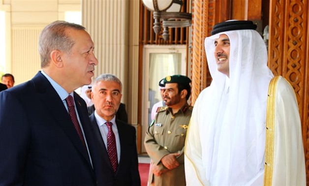 Qatar’s Emir Sheikh Tamim bin Hamad Al Thani (R) and Turkish President Recep Tayyip Erdogan (L) - press photo