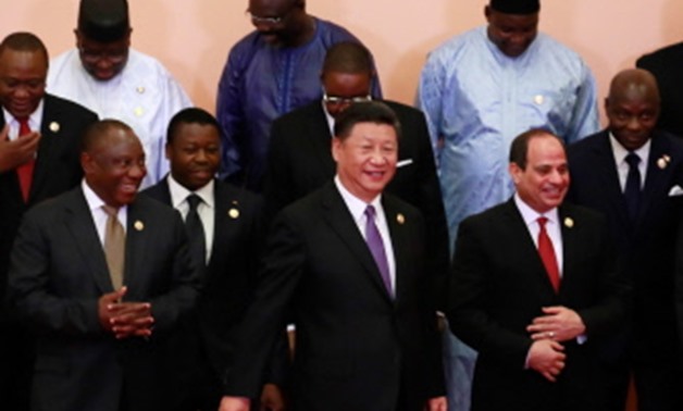China's President Xi Jinping (front C), South Africa's President Cyril Ramaphosa (front L), Egypt's President Abdel Fattah al-Sisi (front R), Kenyas President Uhuru Kenyatta (2nd row L), Togo's President Faure Gnassingbe (2nd row 2nd L), Malawi's Presiden