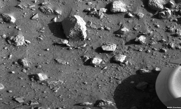 First image taken by Viking 1 on July 20, 1976 to show that the lander
