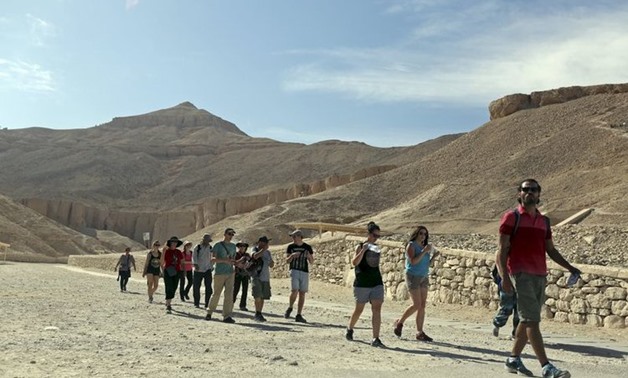 Tourists are seen at the Temple of Hatshepsut, a day after a hot air balloon crash left 19 foreigners dead, in Luxor, February 27,2013- Reuters/ MOHAMED ABD EL GHANY
