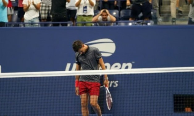 © AFP | Tough defeat: Dominic Thiem walks off after losing to Rafael Nadal